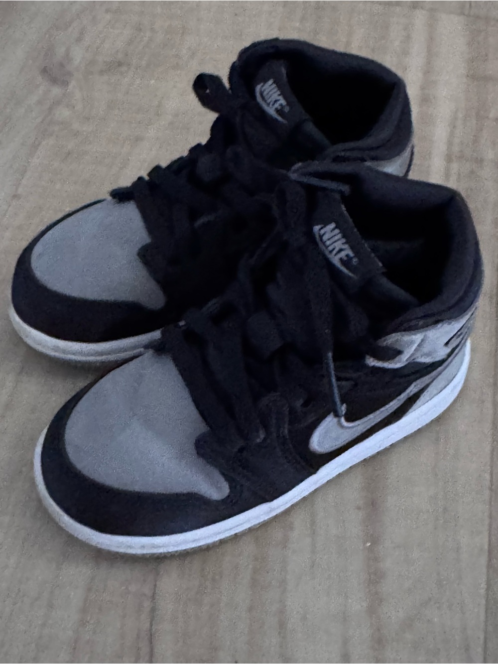 Jordan 1 retro height OG Nike Kids Black and Gray High-Top Sneakers